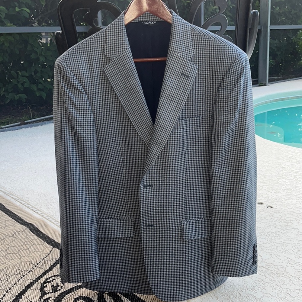 Jos A Banks blue and black dog toothed jacket.